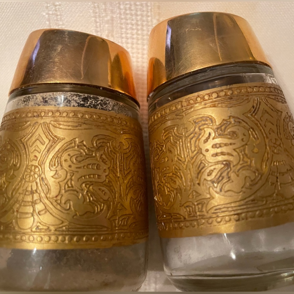Gold trim salt and pepper shakers. 14K